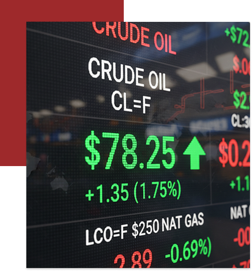 Electronic display showing crude oil prices: $78.25 with a green upward arrow, indicating an increase of 1.35 (1.75%). Other commodity prices and percentage changes are visible in the background.